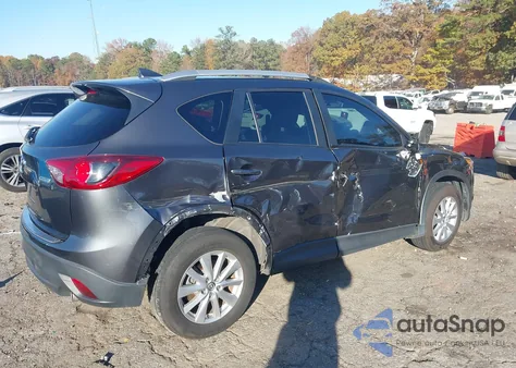 2016 Mazda Cx-5 Touring z USA, uszkodzony, nr VIN JM3KE2CYXG0745492